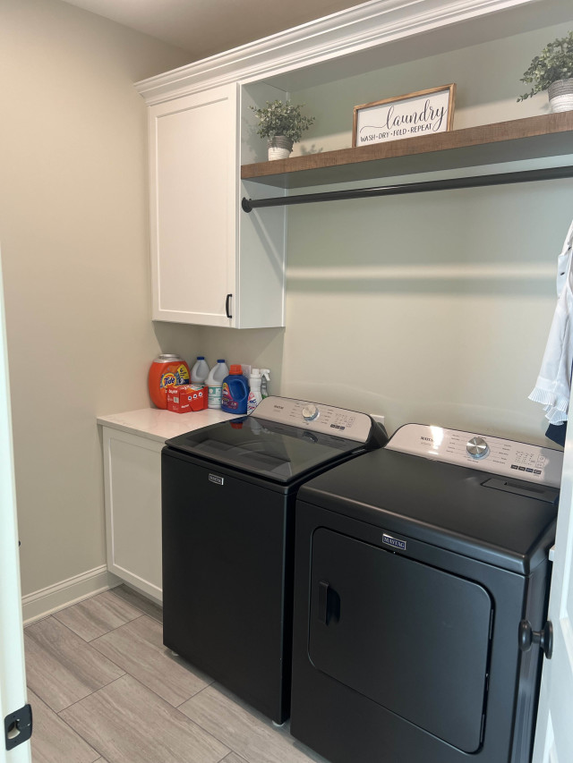 Built from scratch, this new space features custom cabinets, a dedicated hanging area, and modern appliances, all designed to maximize functionality.