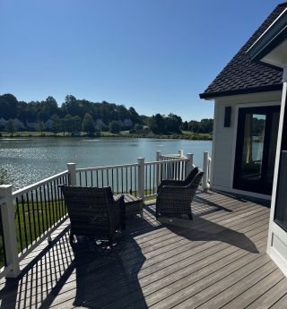 Finished composite deck overlooking the lake at a Landenberg PA home addition.